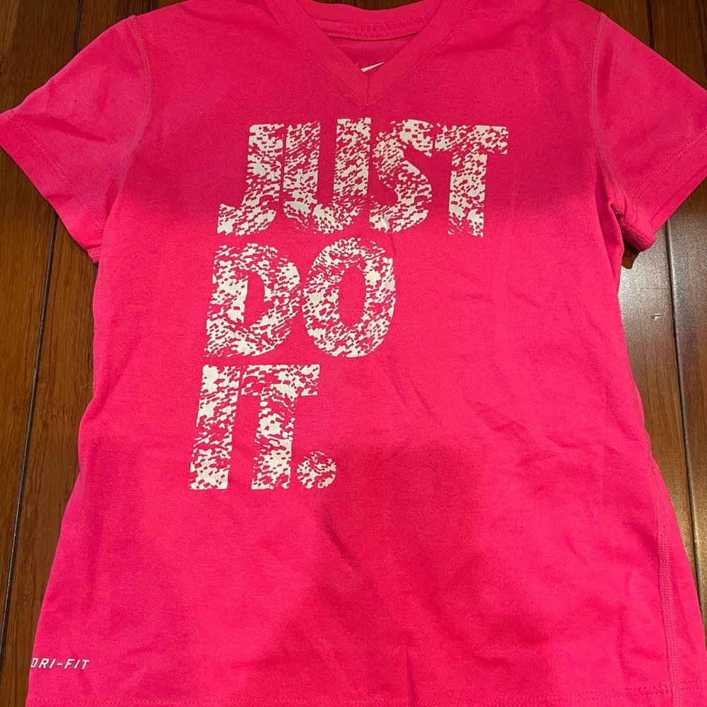 Hot pink shirt with white letters